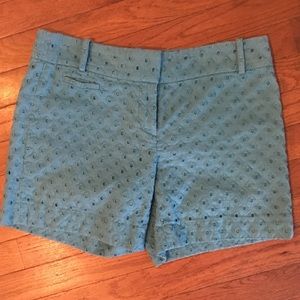 Teal shorts with embroidered print, size 2